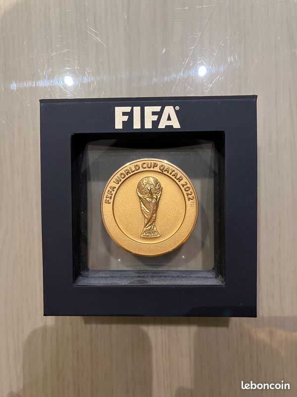 Création d'une agrafe Coupe du monde de football Qatar 2022 - L'Essor