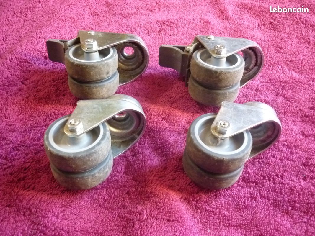 Lot de 4 Roulettes pivotante double galet - fixation œil - ø 50 mm- deux avec blocage “stopfix” (image 1)