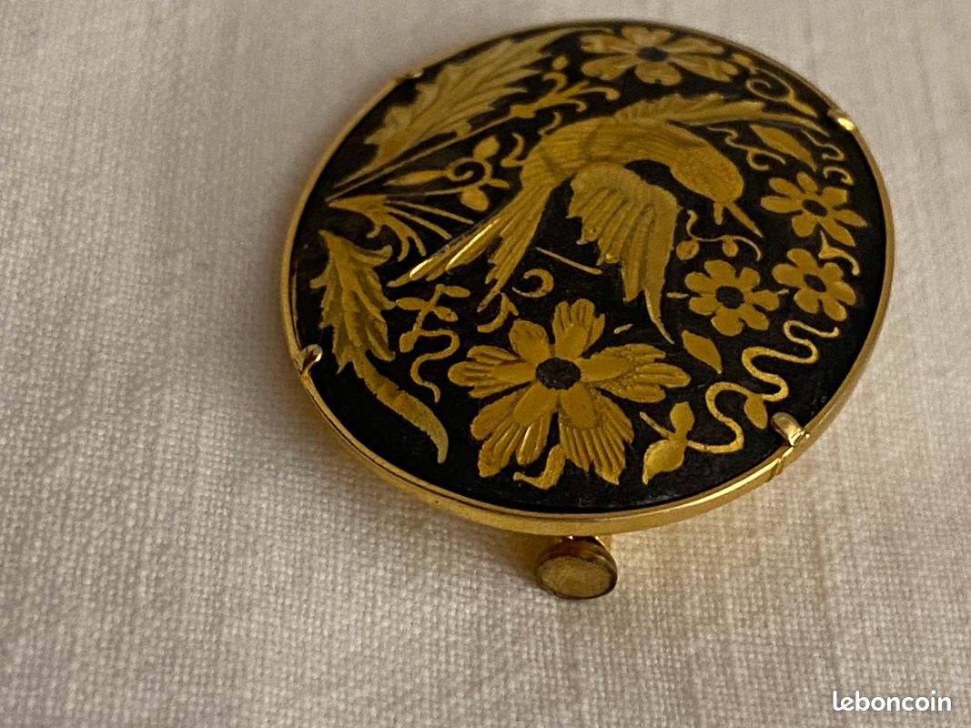 Broche-barette en or platine et or gris, à décor géométrique ornée en