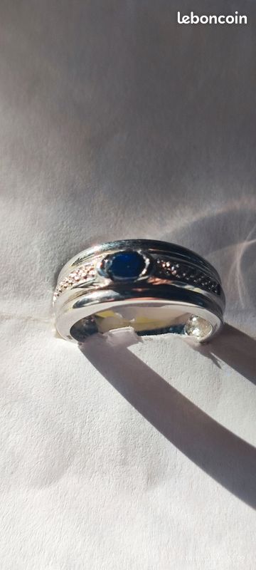 Bague en argent massif rhodié avec pierre bleue - Montres & Bijoux