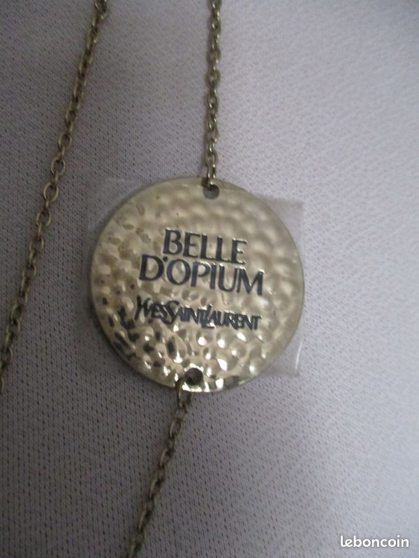 Collier Pendentif YSL OPIUM - Pendentif Parfum, Plastique, Occasion Bon état
