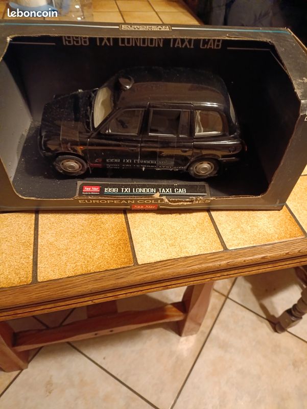 1998 tx1 london taxi cab sun star 1/18 neuve en boite - Collection