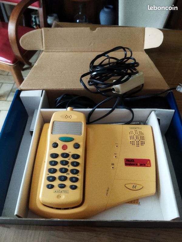 Téléphone Alcatel jaune (image 1)