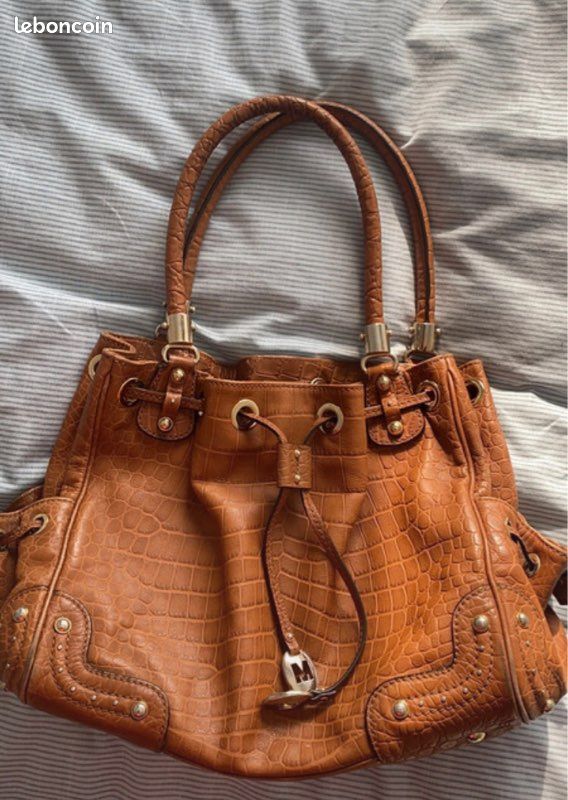 Sac à main marque Michael Kors en cuir crocodile bourse marron (image 1)