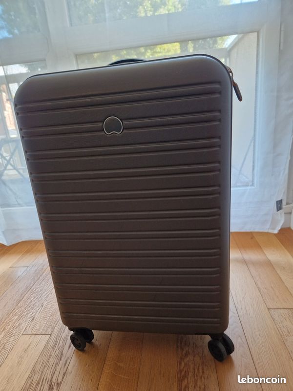 Valise Delsey rigide grand format- Excellent état (image 1)
