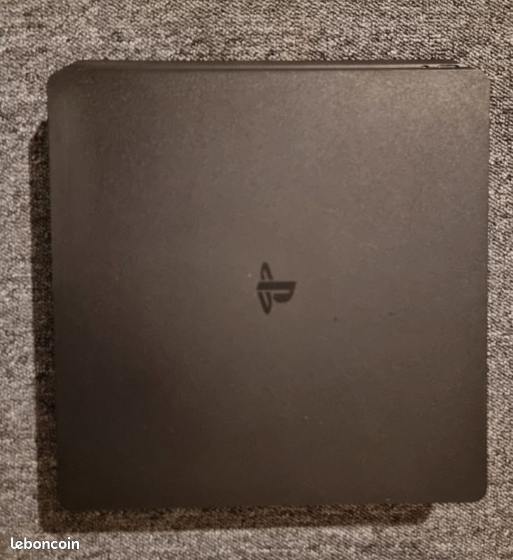 PlayStation 4 Slim — Très bon état (avec câbles, sans manette) (image 1)