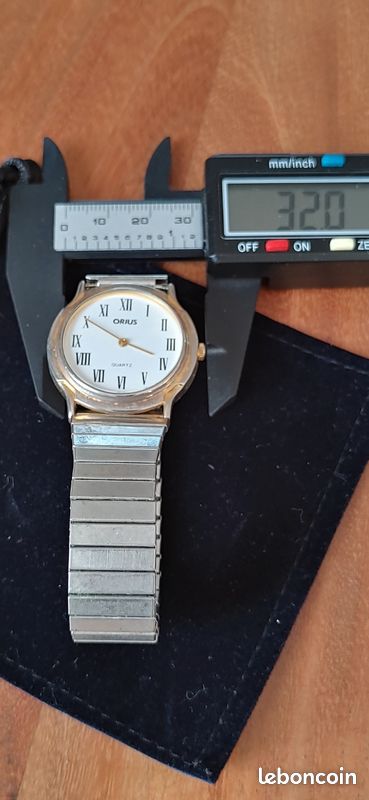 Montre ORIUS QUARTZ Vintage Des Années 60 - À Réparer Ou Pour Pièces - Bracelet Acier Inox