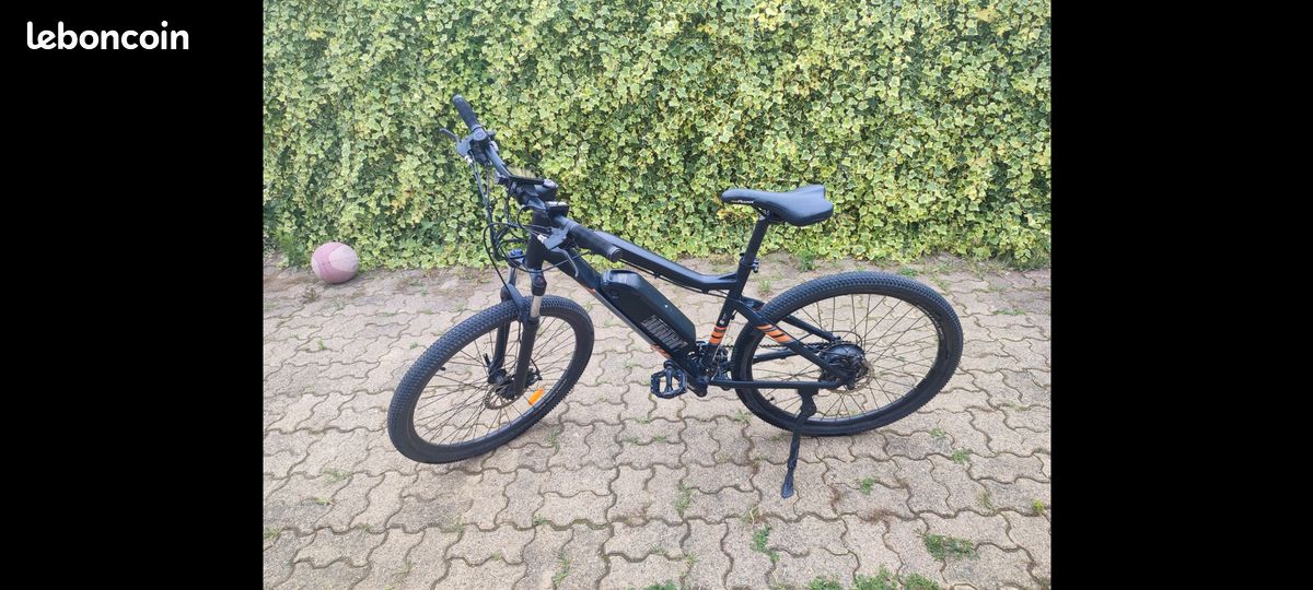Vélo électrique Essentielb VTT Urban Trail 200 noir Vélos