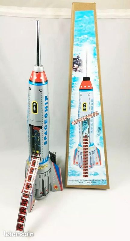 La fusée spatiale Skyexpress miniature style jouet ancien en métal Tin