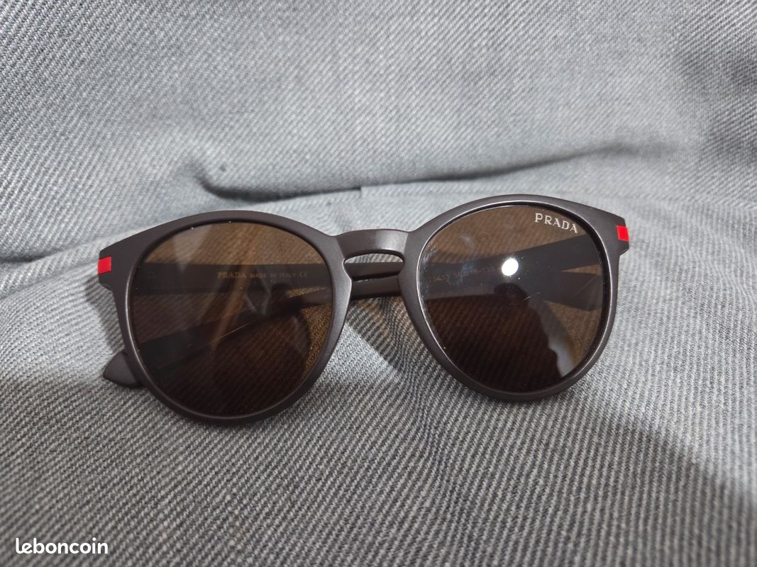 Lunettes de soleil Prada noires, verres marron , 25613 56■18-138 (image 1)