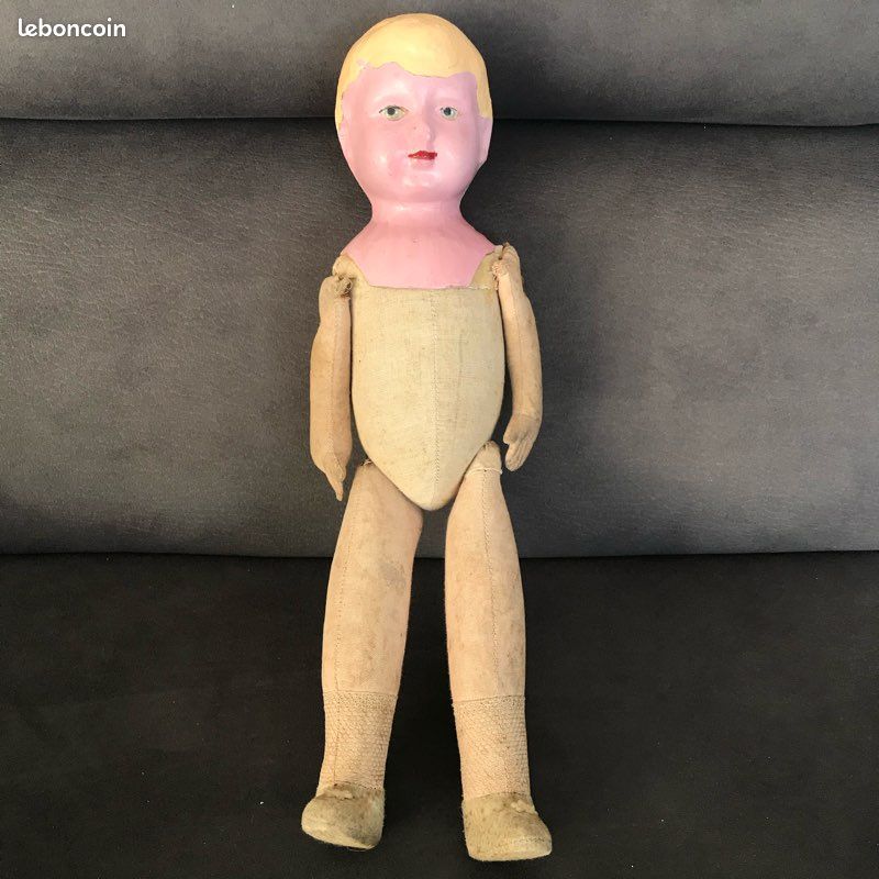 Belle poupée en bois toute articulée - auctions & price archive