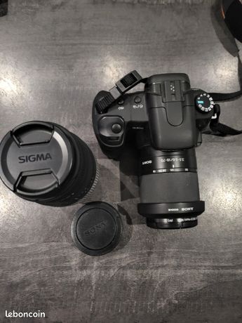 NIKON D9O équipé objectif sigma DC18-200 bon état avec chargeur 2 bat
