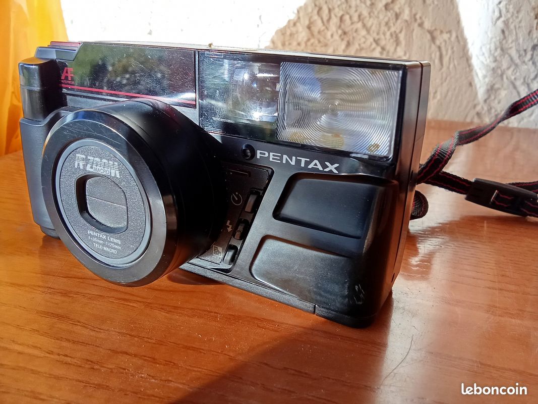 Asahi: Pentax IQ-Zoom 70 Price Guide: estimate a camera value