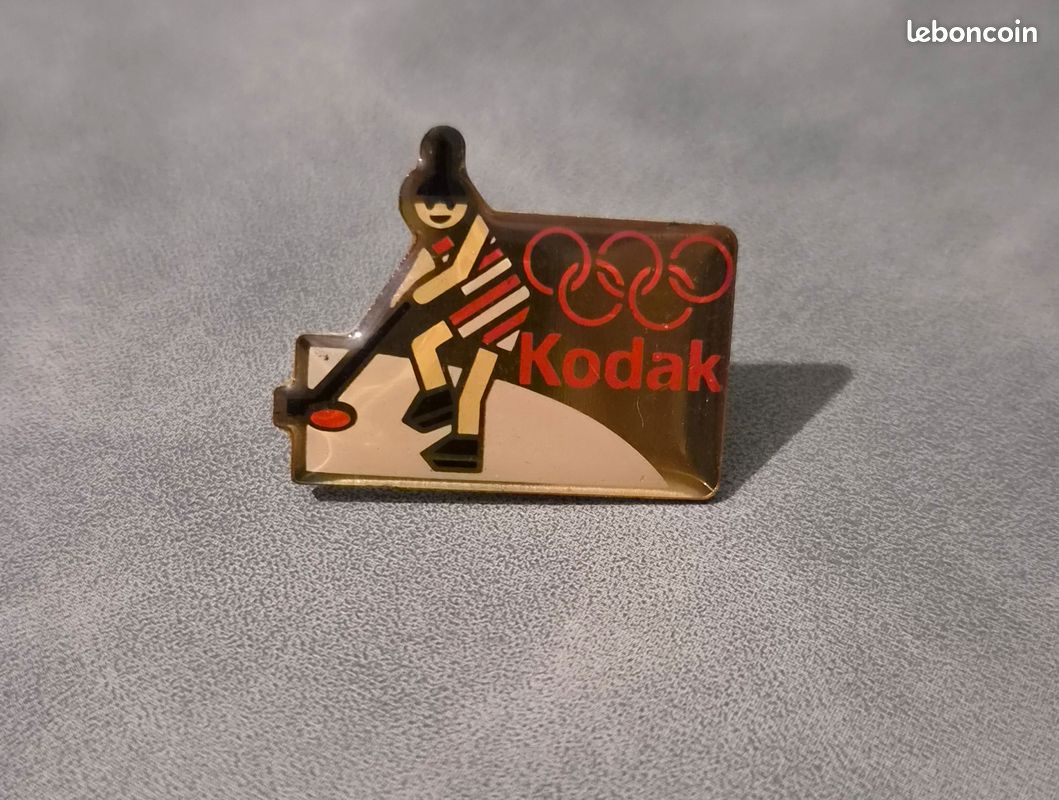 Pin's Kodak Jeux Olympiques – Modèle Tir – Email – Occasion