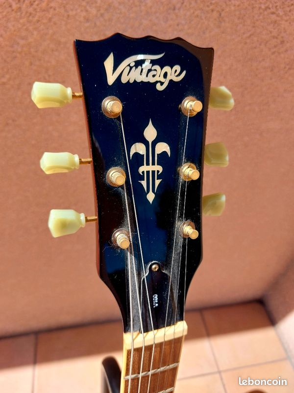 vintage v100 tobacco sunburst guitar / TSB (tobacco sunburst) / out phase tone the V100TSB is a statement piece thats capable of handling any style of music. Guitare lectrique Vintage V100 (Tobacco