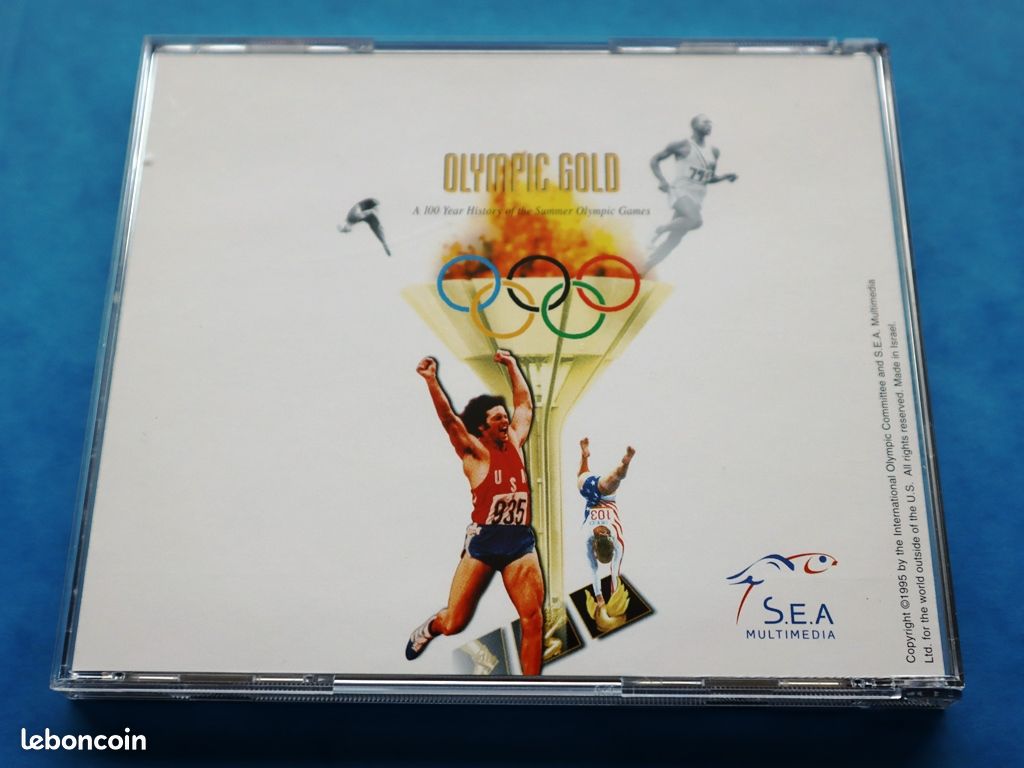 Pin's Jeux Olympiques Atlanta 1996 – Izzy Et Athlètes En Mouvement – Neuf Sous Emballage – Au Choix