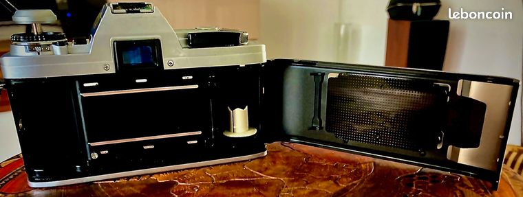 Minolta X300 S is a 35 mm SLR camera with 28 mm