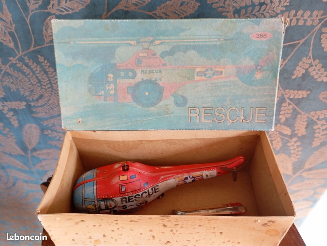 Hélicoptère militaire ancien jouet mécanique à pousser jimmy toys hong kong - Collection