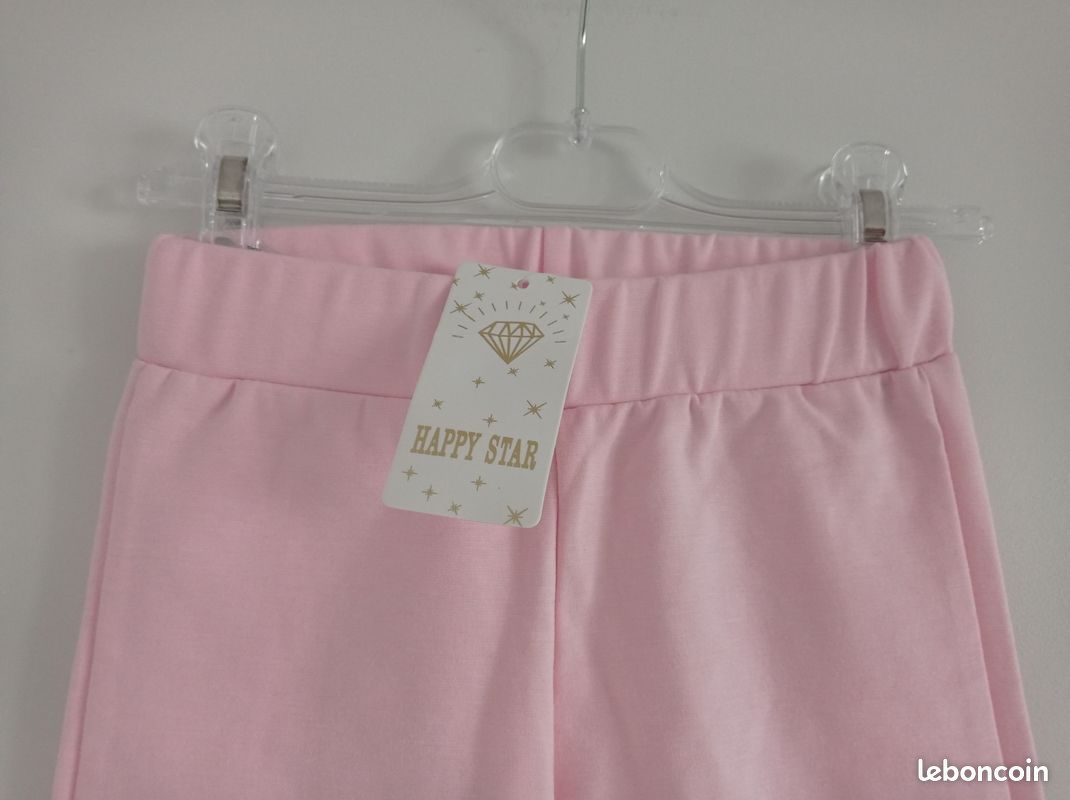 Legging rose clair fille 10 ans habillé perle et strass en forme noeud papillon Neuf étiqueté jamais porté Mini tâche. Voir photo 3 Matière un peu épaisse Taille élastique (image 2)