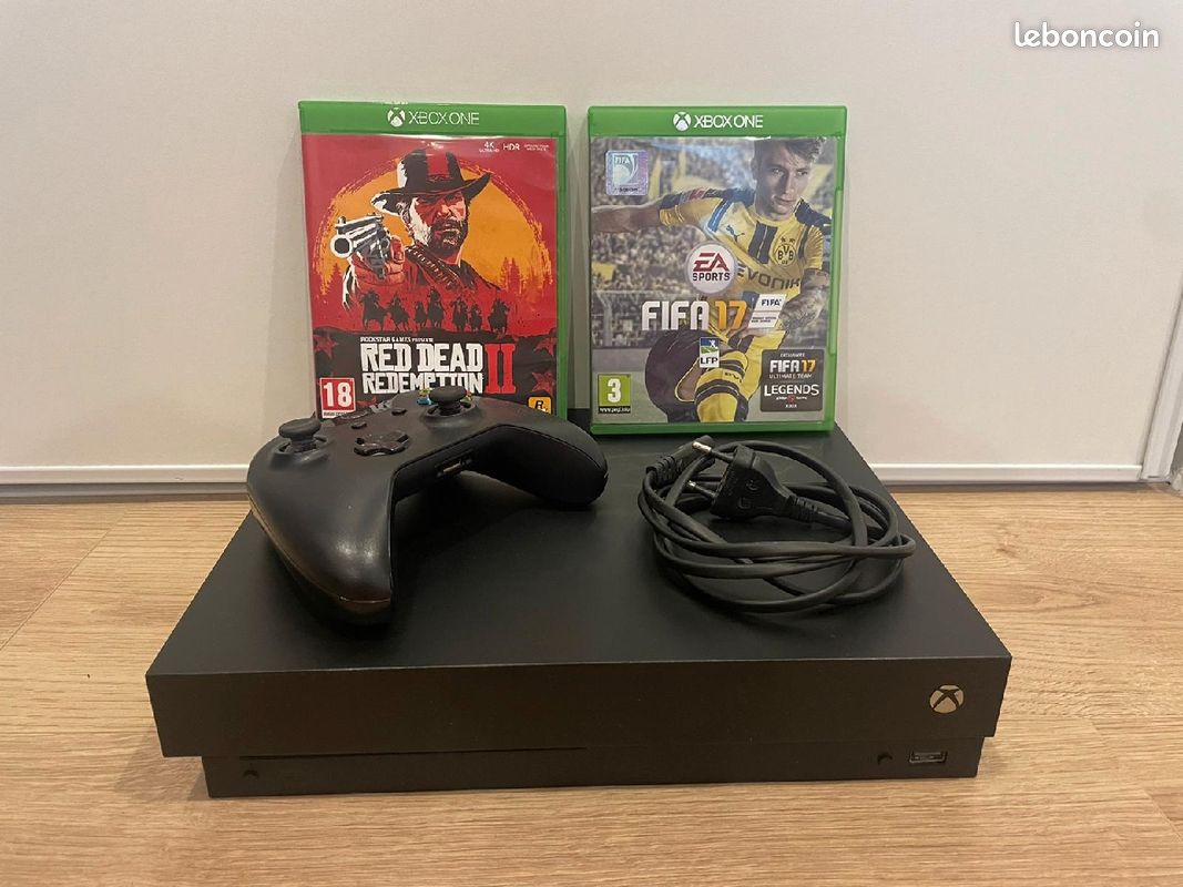 Xbox one x + manette + 2 jeux (image 1)