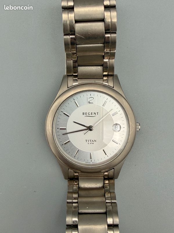 Montre Femme Regent – Cadran Blanc, Bracelet Acier Inox Argenté – Mouvement Quartz – Neuf Sans étiquette