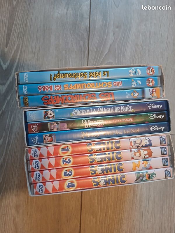 Lot de 3 boîte DVD ( les schtroumpfs,Mickey,Sonic) (image 1)