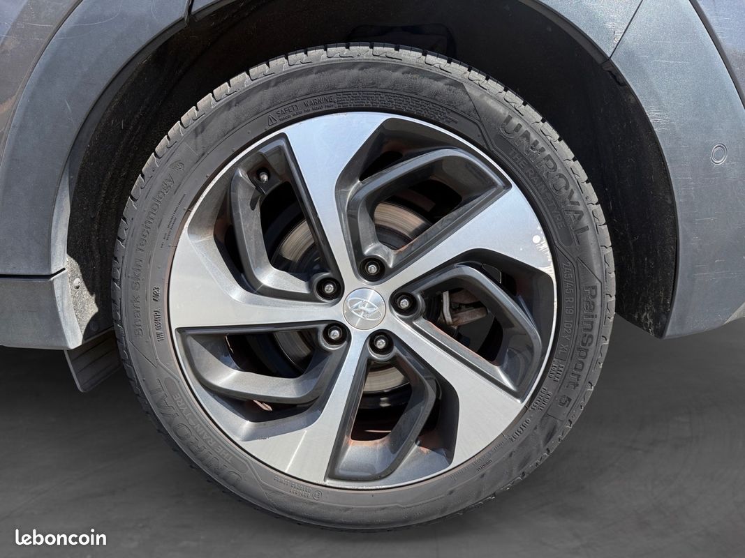 HYUNDAI TUCSON 1.7 CRDi 141 2WD DCT-7 Executive - GARANTIE 12MOIS - TOIT OUVRANT - CAMERA DE RECUL - SIEGES VENTILE (image 23)