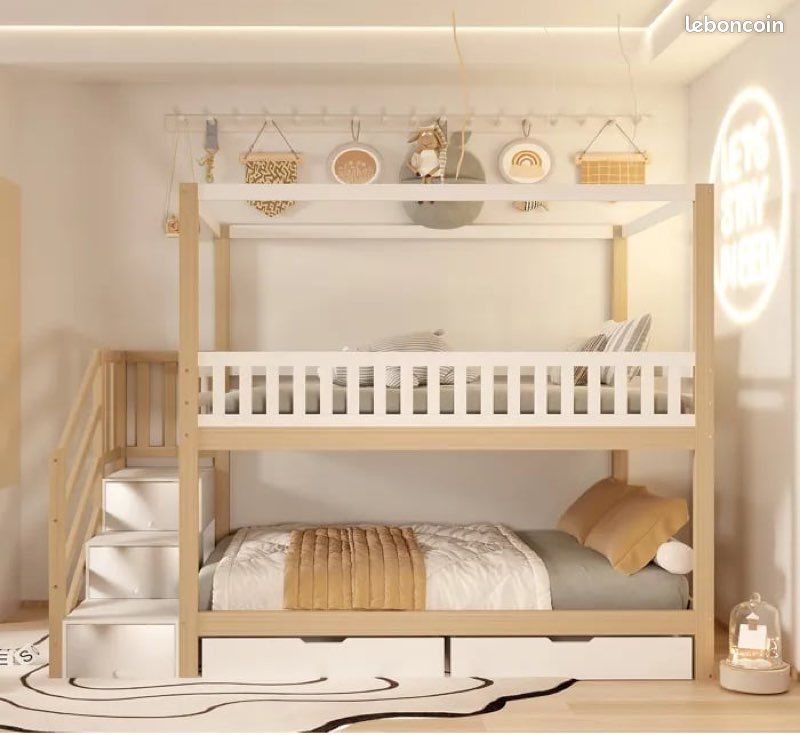 Vends un lit superposé avec tiroir pour rangements, des marques d'usure