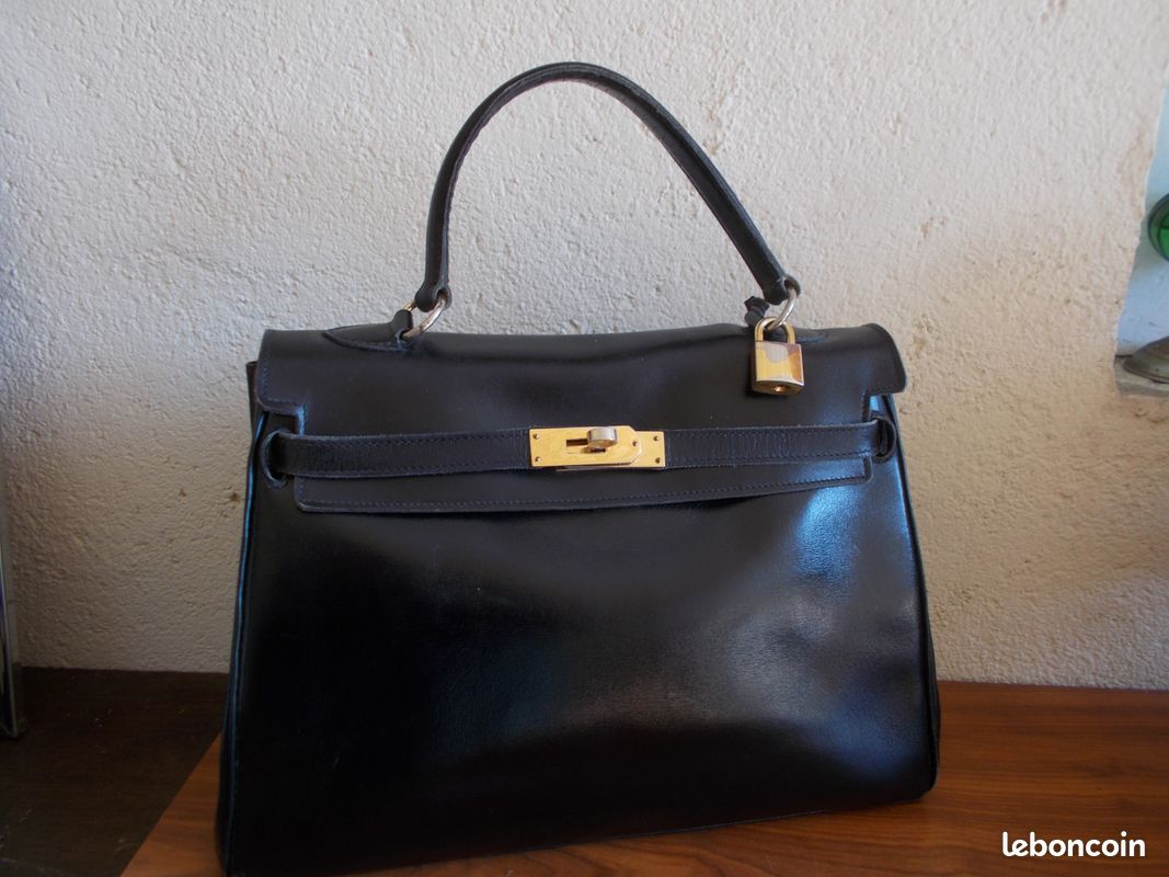 Sac a main noir en cuir très class - Accessoires & Bagagerie