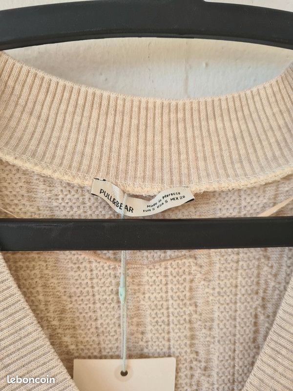 Pull long col V sans manches (image 9)
