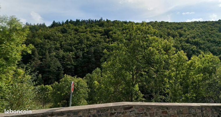 Terrain 1 228 m² avec vue dominante sur rivière