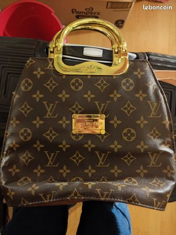 Sac à main Louis Vuitton Babylone 380135 d'occasion