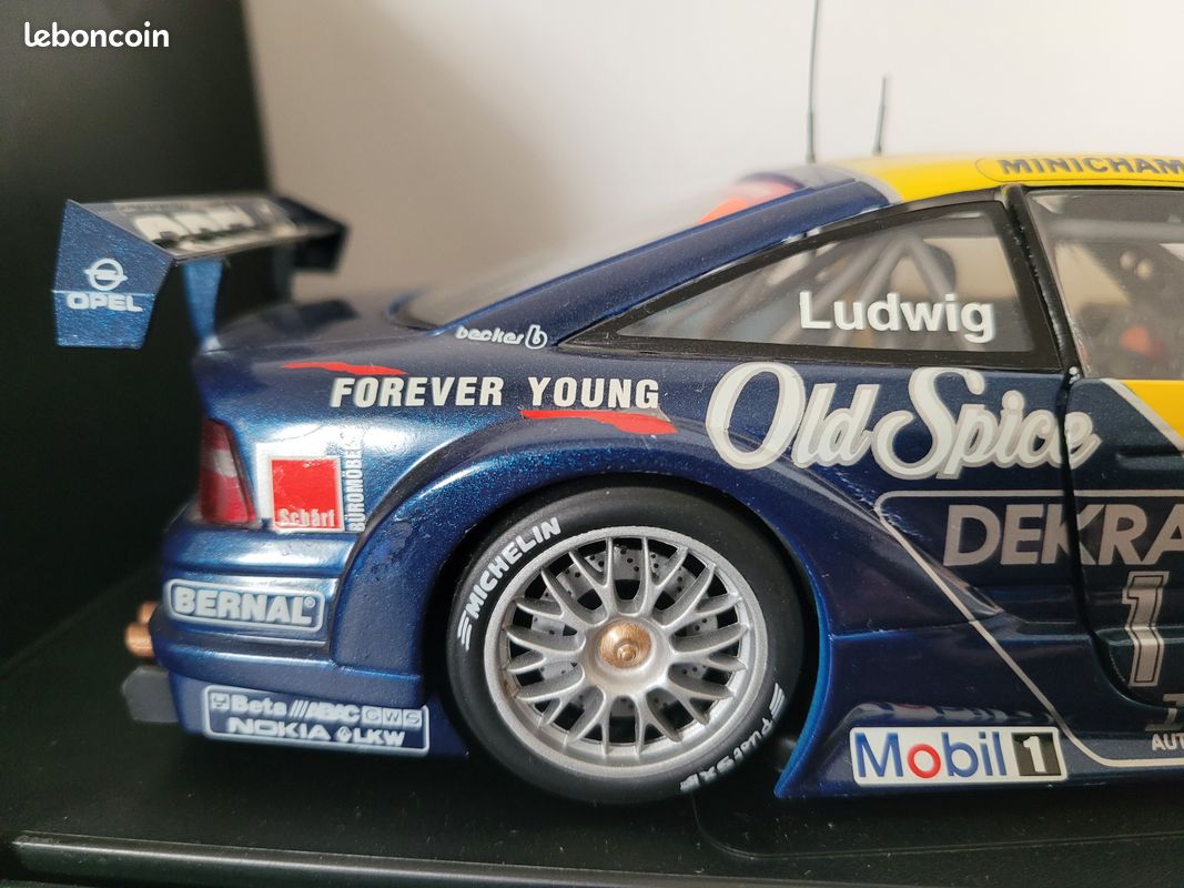 OPEL CALIBRA V6 4x4 DTM Rosberg #2 Old Spice au 1/18 UT MODELS voiture miniature