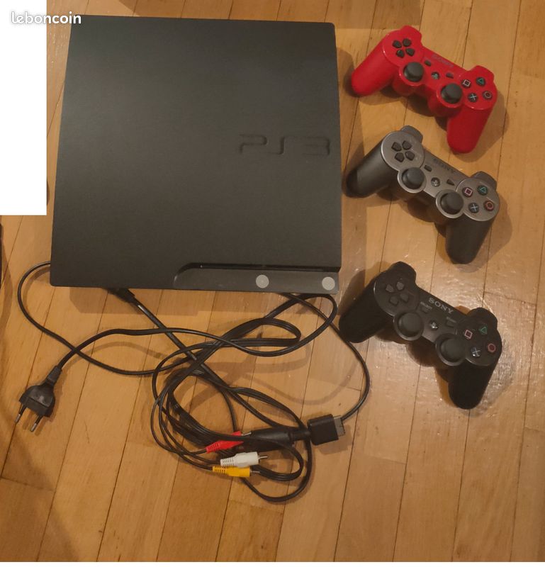 Playstation 3 slim avec 3 manettes et 13 jeux (image 1)