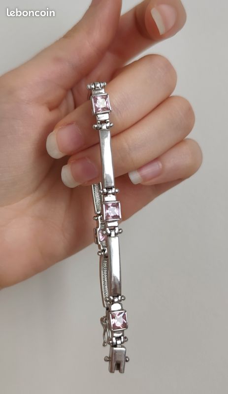 Bracelet en argent massif poinçonné 925 et zirconiums roses (image 1)