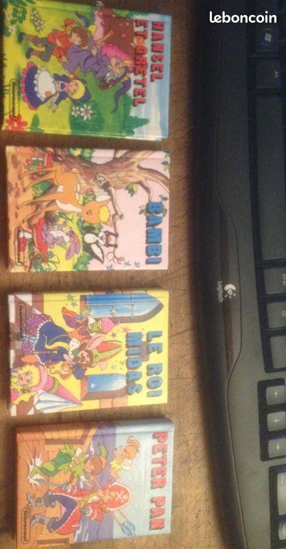 Lot de 4 mini livres - état neuf (image 1)