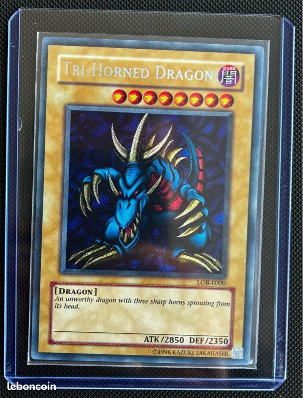 Tri-Horned Dragon - LOB-E000 - Secret Rare (image 1)