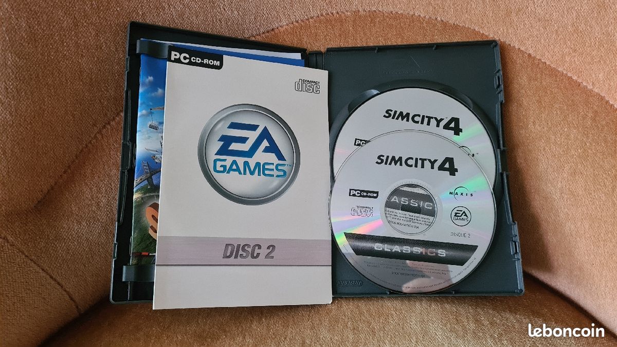 2 jeux PC et 1 DVD, SIM CITY, Hôtel Giant et Madagascar - Jeux vidéo