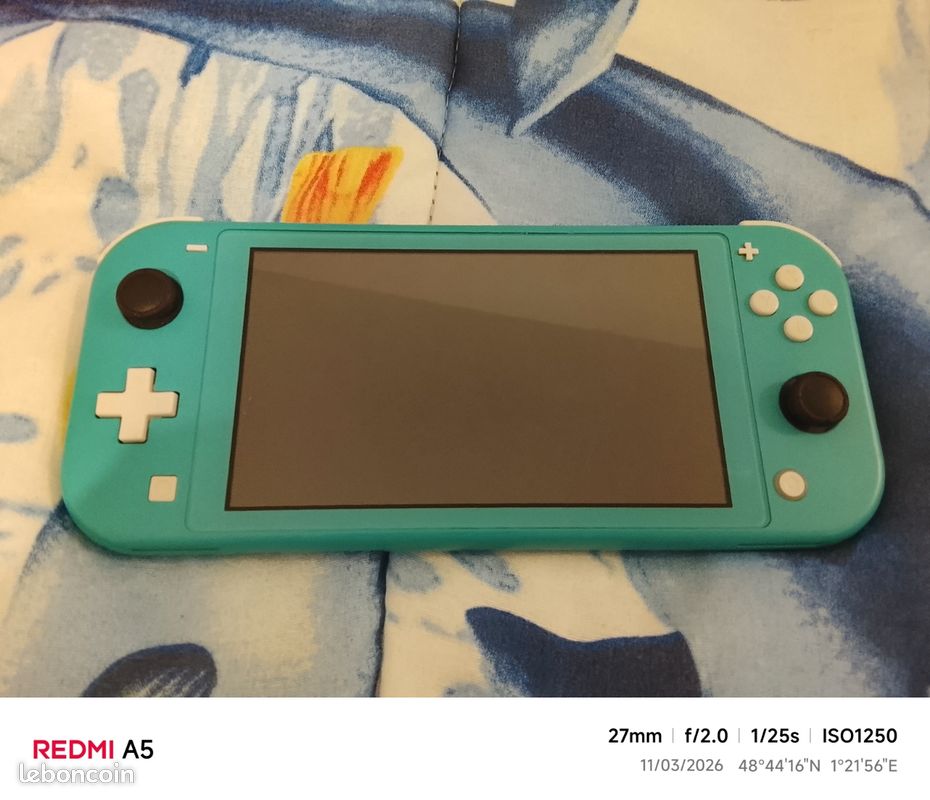 Switch Nintendo Lite Turquoise + boîte de rangement (image 1)