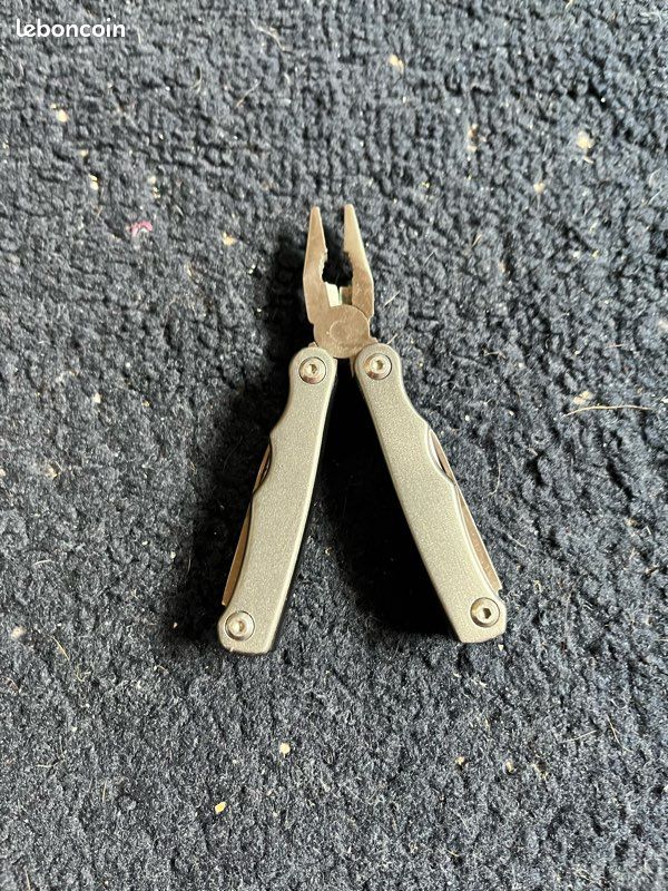 Couteau multi fonction (image 1)