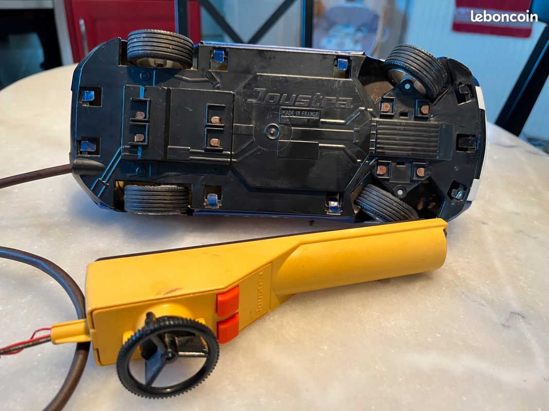 Sold Price: JOUSTRA: Porsche 917 téléguidée en plastique, jaune, dans