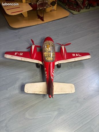 223 - Joustra: Avion tôle rallye FR-RAL ref 563 (1970) rouge/blanc en