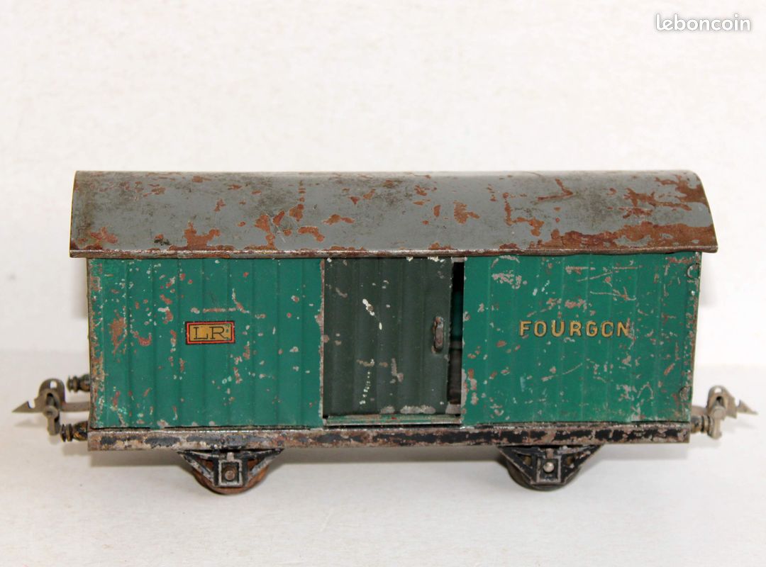 wagon de fret Wagon à ranchers Kk-w 7301 avec chargement de bois RhB