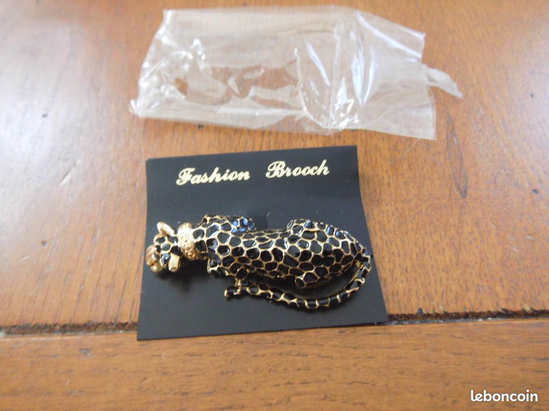 Cartier Broche panthère en or jaune 18 carats - En vente sur France