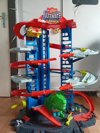 Hot Wheels City Super Dino Robot Garage avec T-Rex, pour contenir