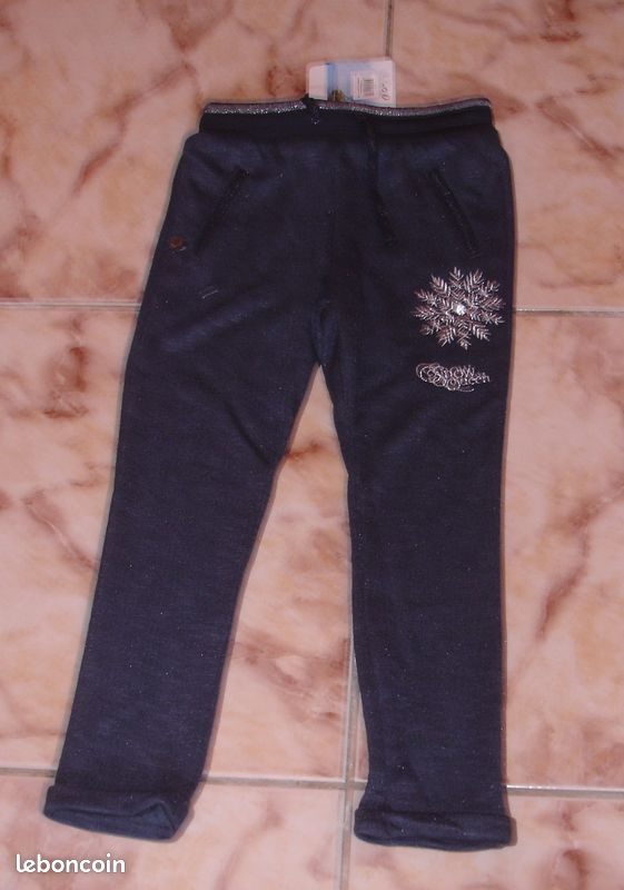 Pantalon marine motifs reine des neiges frozen disney neuf ans