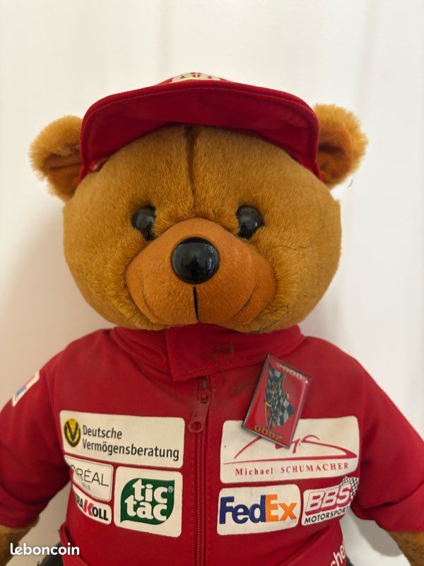 Ours en peluche publicitaire Ferrari pub bridgestone formule