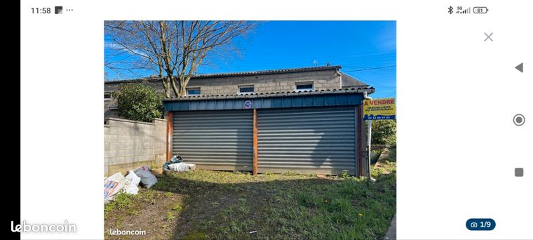 Grand garage/ atelier situé en ville de SOURDEVAL