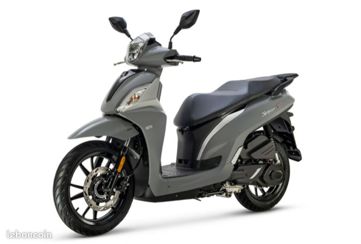 Beau scooter sym 125 neuf (image 1)