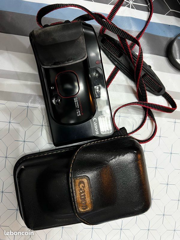 Appareil photo CANON Autofocus argentique avec étui cuir (image 1)